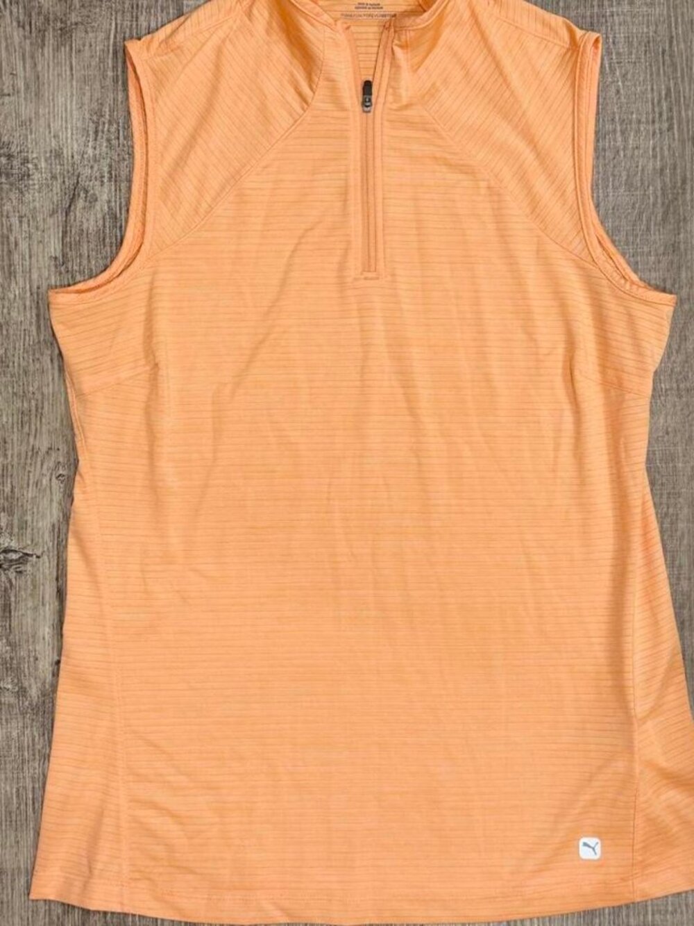 PUMA Golf Sleeveless Quarter Zip Top | Peach Apricot Ribbed Polo